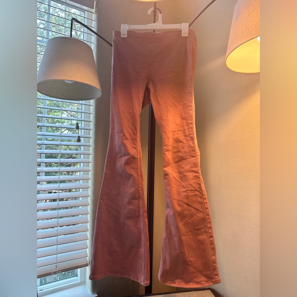 Pink bell bottom cut soft jeans, size 28
